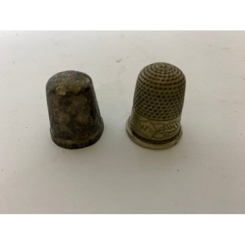 74 - 4 sterling silver thimbles.