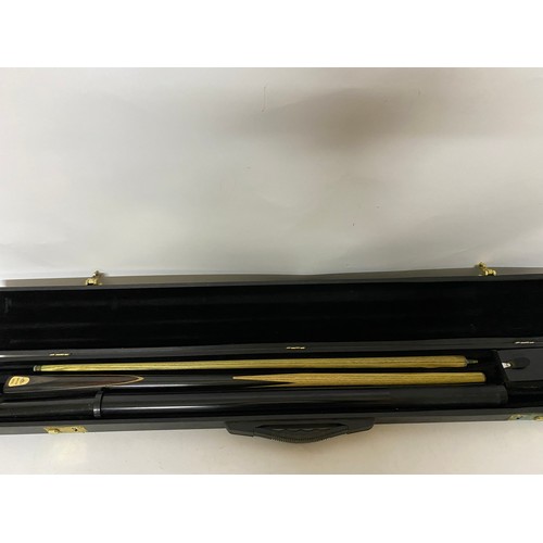 77 - 4 piece snooker cue in carry case