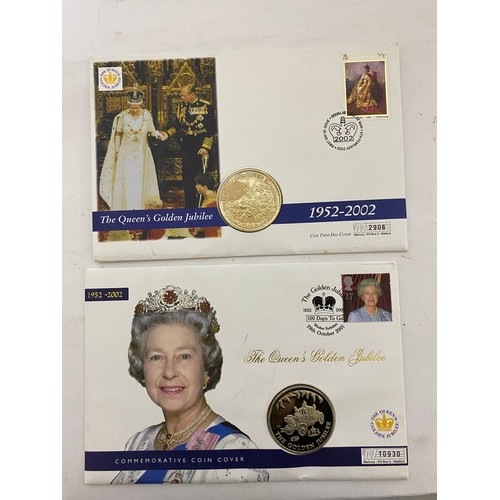 87 - Mint first day covers with uncirculated 20p, £1, £2, and 50p coins and crown covers