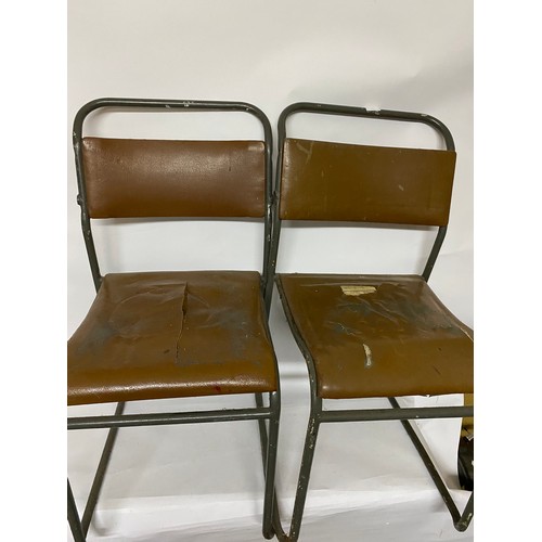 25 - 2 vintage metal stacking chairs.