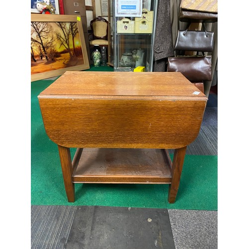 369 - Mid Century occassional table with drop sides and drawer to end. 66 x 68 x 43cms