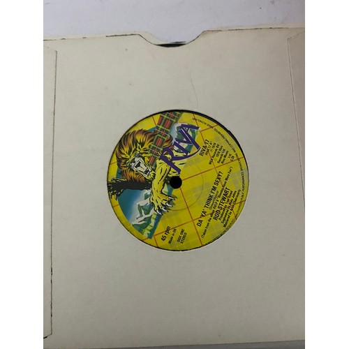 404 - Selection of 67 singles in singles case. Artists include Queen, Elton John, Rod Stewart, Joe Jackson... 