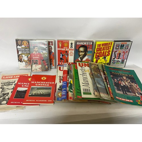 405 - Collection of Manchester United memorabilia including programmes, videos, books etc