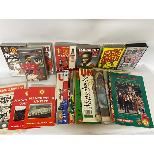 405 - Collection of Manchester United memorabilia including programmes, videos, books etc