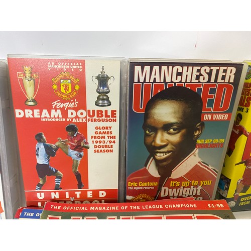 405 - Collection of Manchester United memorabilia including programmes, videos, books etc