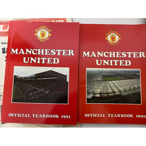 405 - Collection of Manchester United memorabilia including programmes, videos, books etc