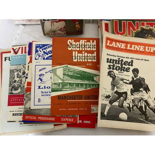 405 - Collection of Manchester United memorabilia including programmes, videos, books etc