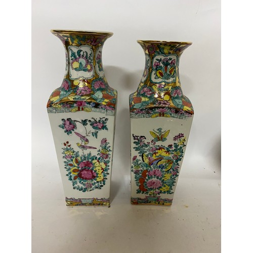 420 - 2 x pairs of Chinese vases and a pair of Chinese urn's. Largest vase measures 32 cms