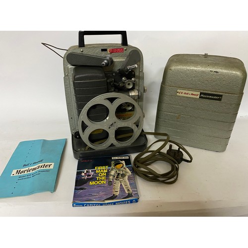 426 - G B Bell and Howell moviemaster 8mm film projector with instructions book and 8mm colour silent film... 