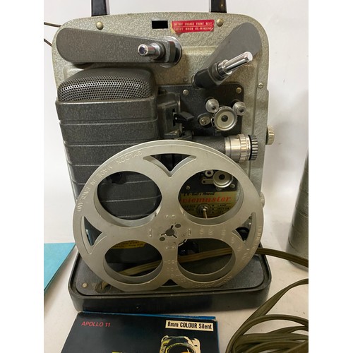 426 - G B Bell and Howell moviemaster 8mm film projector with instructions book and 8mm colour silent film... 