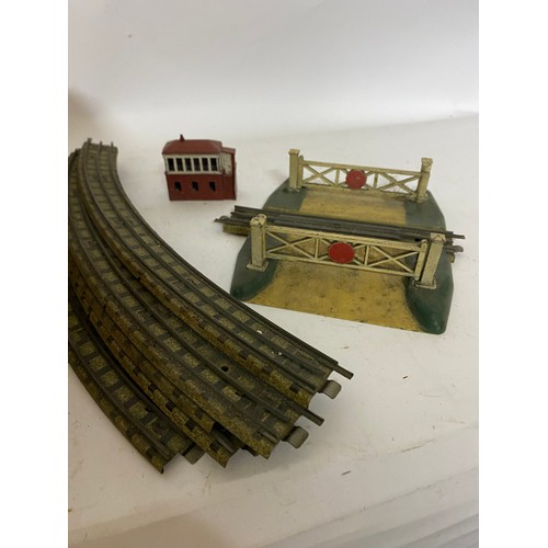 443 - A Hornby Dublo 3 rail level crossing and selection of 3 rail track and a signal box