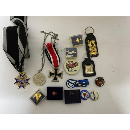 61 - Collection of Military badges, pins and medals.