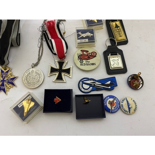 61 - Collection of Military badges, pins and medals.