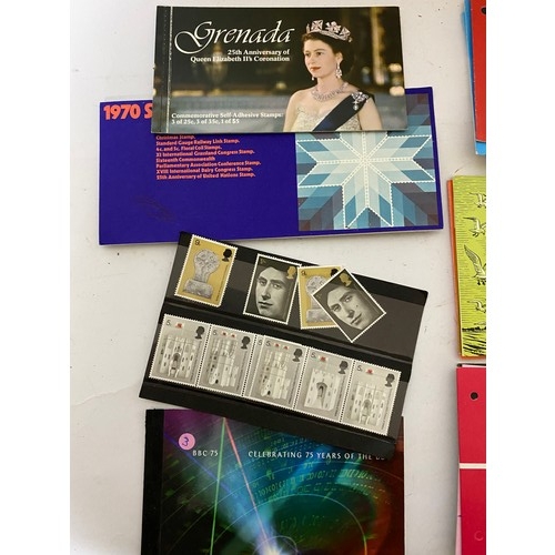 73 - Collection of mint stamps in presentation packs