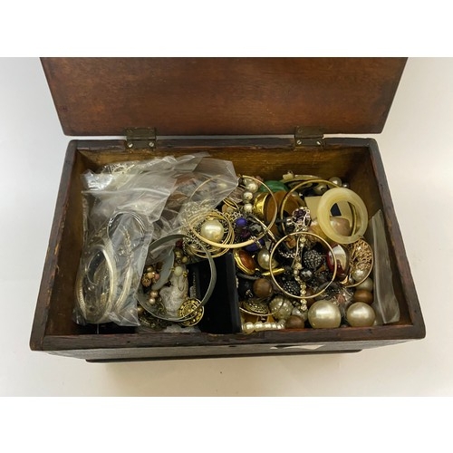 225 - Selection of costume jewellery in wooden box measuring 28 x 18 cms