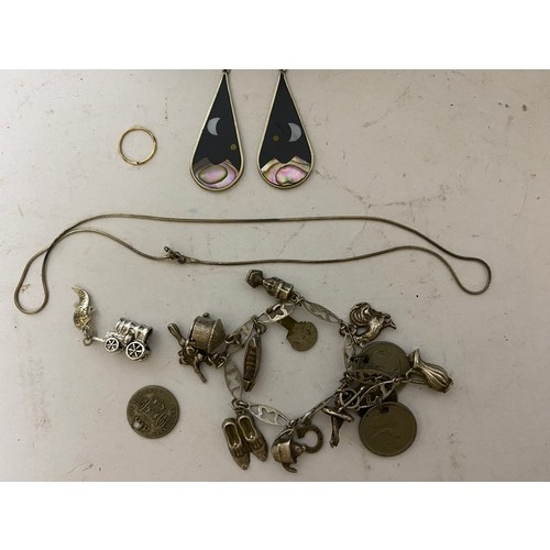 212 - Selection of silver  jewellery including charm bracelet and ear rings.