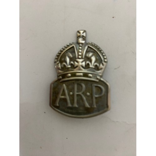 211 - Silver ARP badge,  Silver Life saving medal in box and STOP pendant on chain.