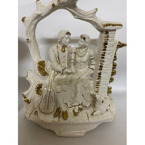 454 - Large flatback figurine in white and gold depicting man and woman and large Italian vase decorated w... 