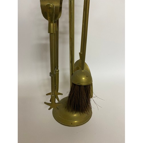 657 - Brass companion set comprising tongs, poker, brush and shovel