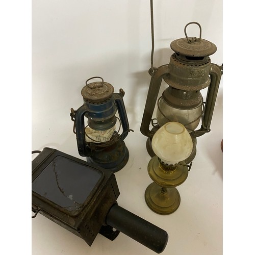 624 - Selection of 7 x oil lamps including tilley lamps, lanterns and coach lanterns.