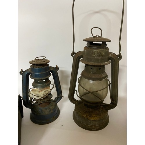 624 - Selection of 7 x oil lamps including tilley lamps, lanterns and coach lanterns.