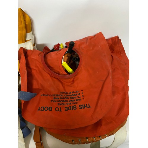 614 - Selection of vintage lifejackets