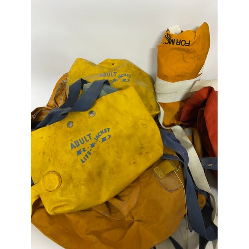 614 - Selection of vintage lifejackets