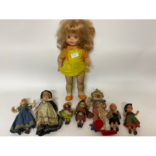611 - Selection of vintage dolls and toys.