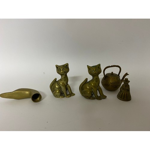 659 - Selection of brassware including 2 x cat candle holders, a duck head for a walking stick, a Welsh la... 