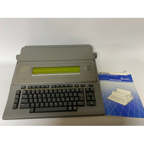 661 - A Sharp personal word processor QL-W20 fully working with operation manual