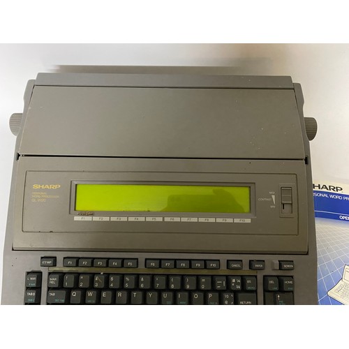 661 - A Sharp personal word processor QL-W20 fully working with operation manual