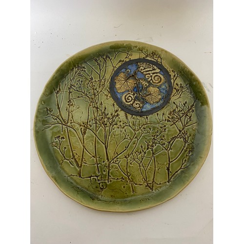 670 - Vintage studio pottery plate with unusual design 26.5 cms