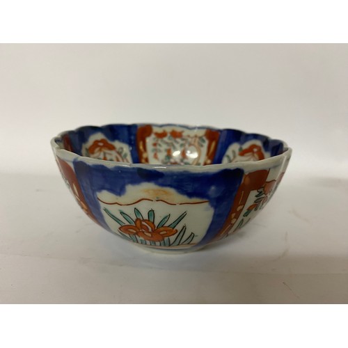 671 - Antique Japanese pottery comprising of a bowl, cup and saucer.