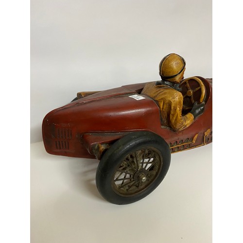 679 - Large model racing car and driver measuring 75 cms long