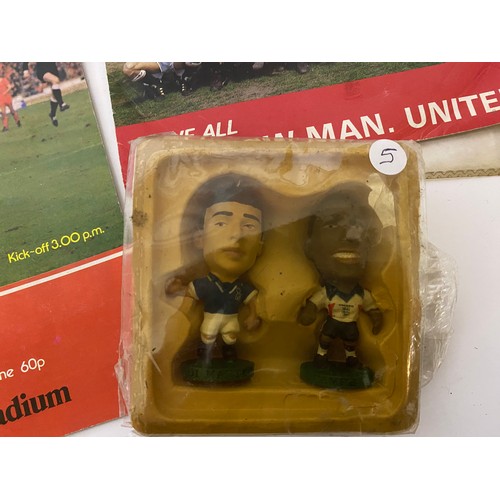585 - Collection of football memorabilia including pennants, rattle, figures, records and badges.