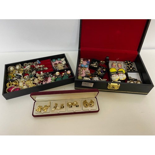 720 - Jewellery box filled with approximately 70 pairs of vintage clip on earrings