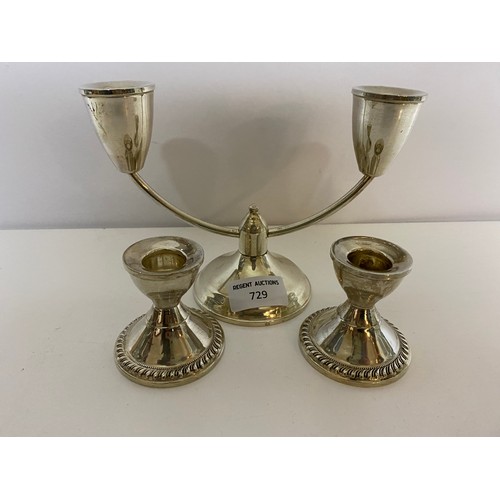 729 - Duchin Creations sterling silver weighted two branch candlestick and pair of small candlesticks