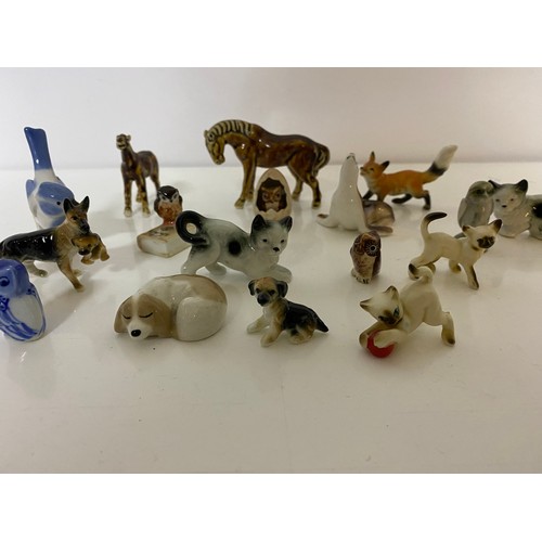 730 - Collection of porcelain animal miniature figures including Lomonosav, Szeiler and Zoocraft