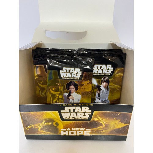 780 - Star Wars A New Hope TCG box of 15 sealed packets containing 7 common cards, 3 uncommon cards and 1 ... 