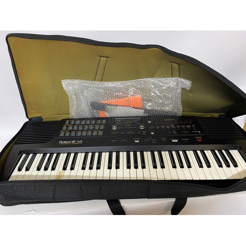 792 - Roland E-14 intelligent keyboard in carry case. Tested and working