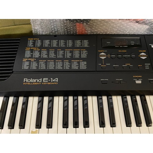 792 - Roland E-14 intelligent keyboard in carry case. Tested and working