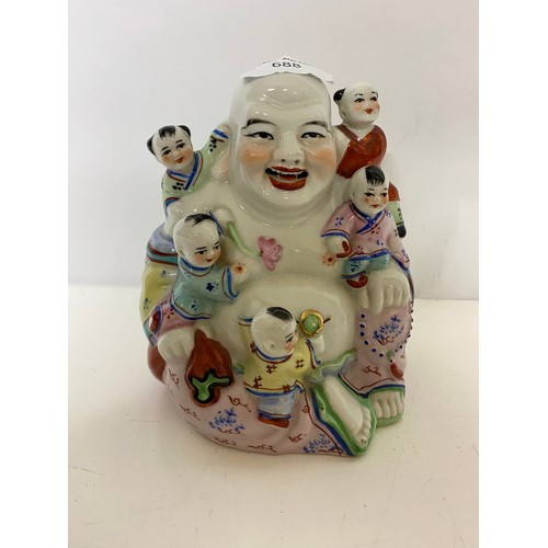 688 - Vintage ceramic Laughing Fertility Buddha, famille rose pattern measuring 15 cms tall