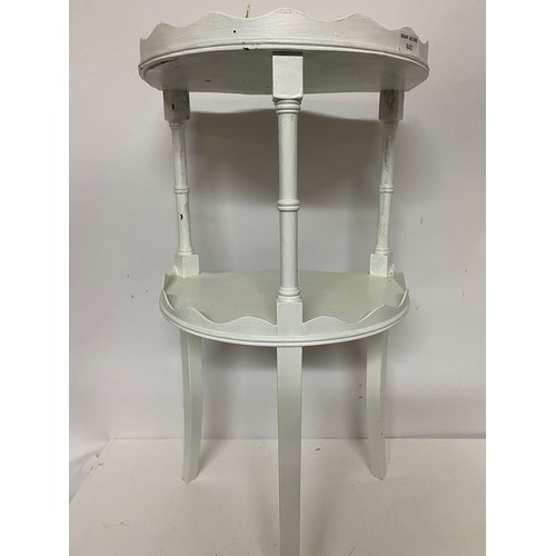 840 - Wooden 2 tiered side table with scalloped edging measuring 35 cms wide x 70 cms tall