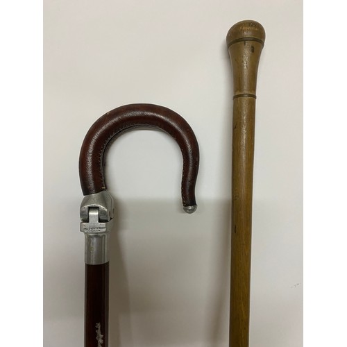 879 - Walking stick/seat from Mills Munition Ltd and wooden walking stick.