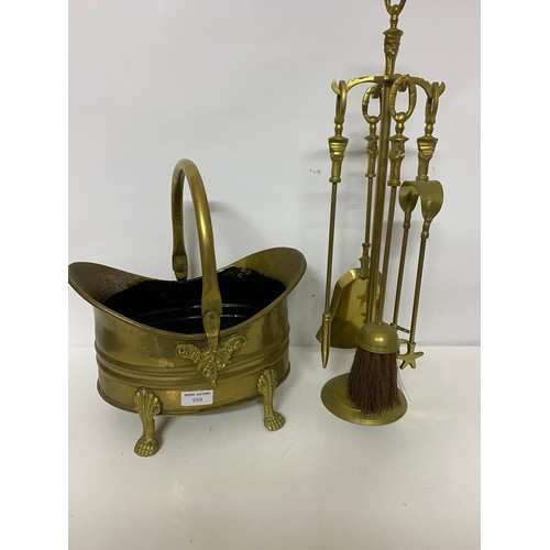 559 - Brass companion set, coal scuttle and fender