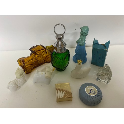 560 - Collection of vintage Avon scent bottles and soaps.