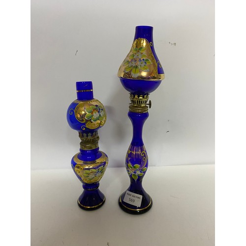 569 - Pair of Vintage blue glass oil lamps, tallest measuring 34 cms tall