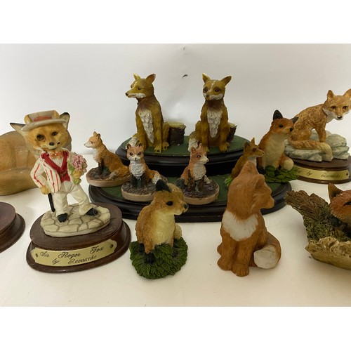 574 - Collection of foxes and stand