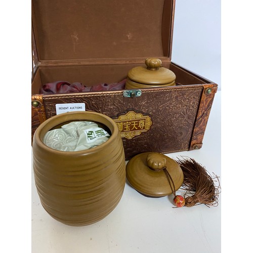 710 - Chinese tea jar set in domed top carry case