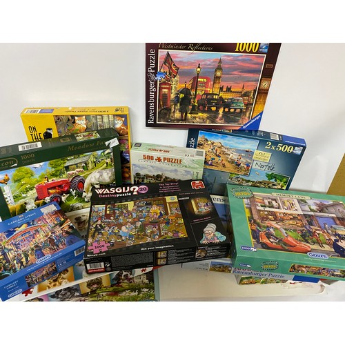 714 - Selection of jigsaws.